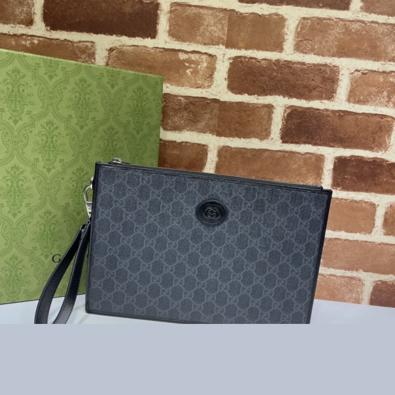 G*u*i clutch bags